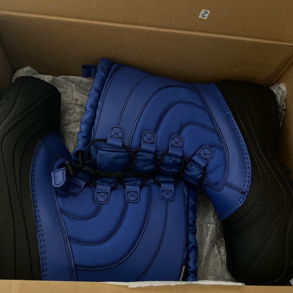 Snow and rain boots new in box